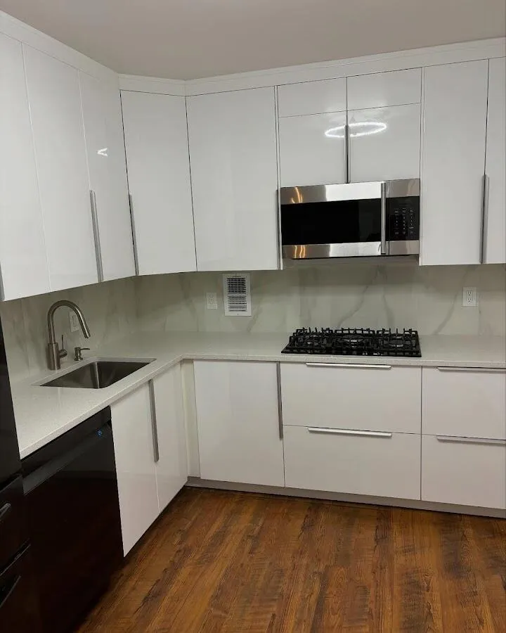 Restored kitchen with white cabinets after water damage in Hellam